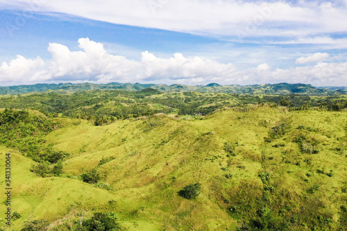 Fototapeta Naklejka Na Ścianę i Meble -  Green hills, aerial view. The nature of the Philippine Islands, Samar.