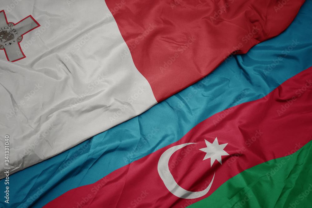 waving colorful flag of azerbaijan and national flag of malta. waving colorful flag of azerbaijan and national flag of malta.