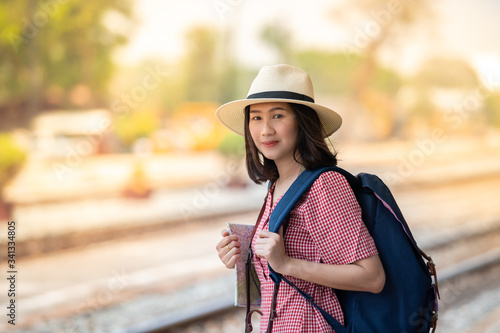 Asian women tourists at the train station.