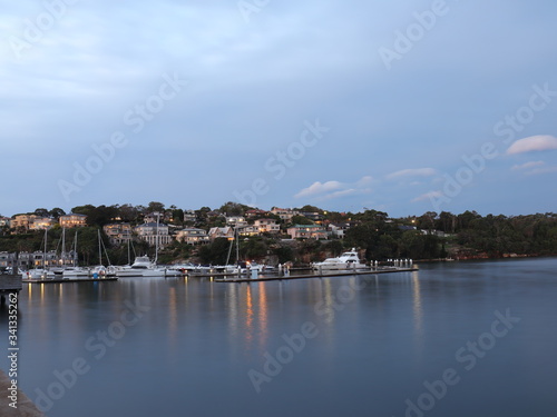Drone Panoramic Aerial view of Sydney Harbour and the beautiful vibrant colours of the afternoon showing smooth harbour waters 