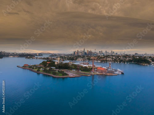 Fototapeta Naklejka Na Ścianę i Meble -  Drone Panoramic Aerial view of Sydney Harbour and the beautiful vibrant colours of the afternoon showing smooth harbour waters 