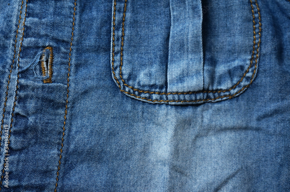 Blue denim Jeans detail and texture background. Blue denim Jeans detail and texture background.