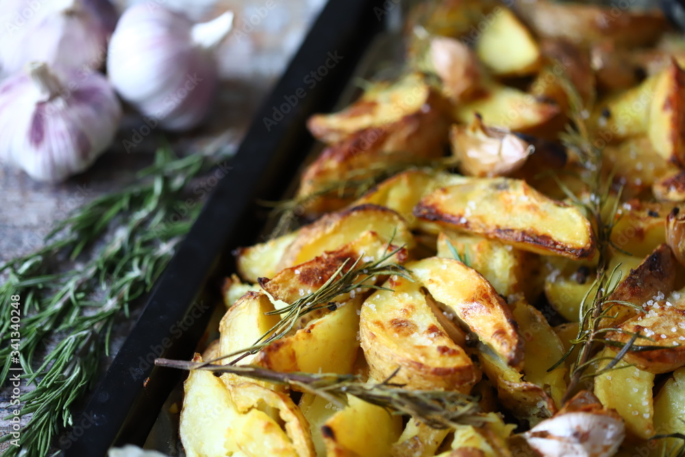 Baked Potato with Rosemary and Garlic. Cooking at home. Baked Potato with Rosemary and Garlic. Cooking at home.