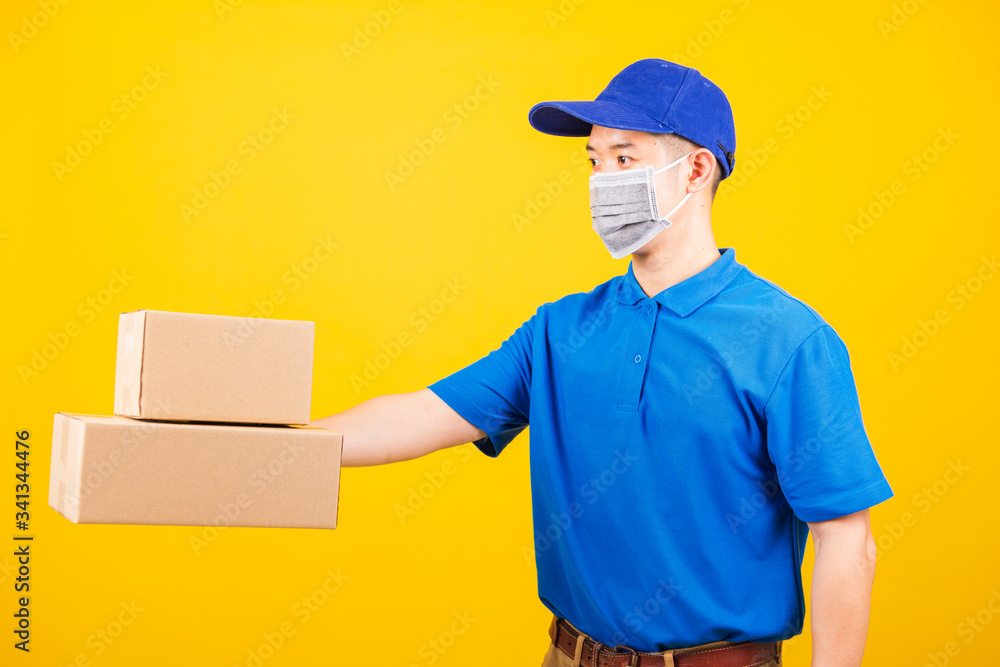 delivery worker man wearing face mask protective giving cardboard boxes delivery worker man wearing face mask protective giving cardboard boxes