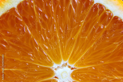 Macro photography of a fresh, ripe, juicy, sweet orange.
