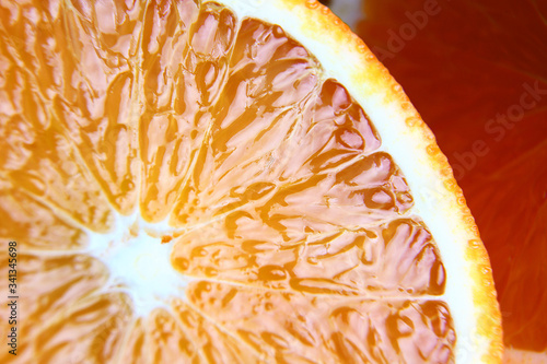 Macro photography of a fresh, ripe, juicy, sweet orange.