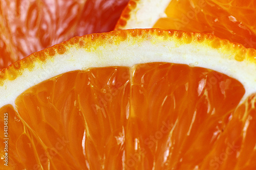 Macro photography of a fresh, ripe, juicy, sweet orange.