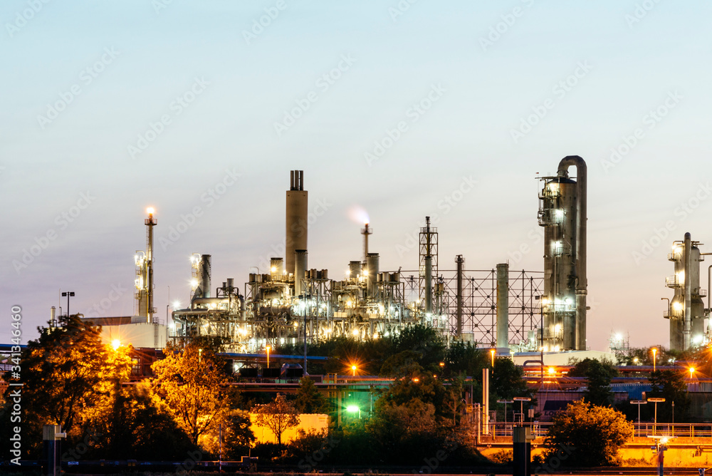 Illuminated industrial plants of a chemical plant at night