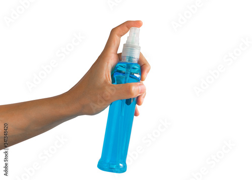 Hand spraying alcohol spray for virus protection. Healthcare and disinfection concept. Object with clipping path