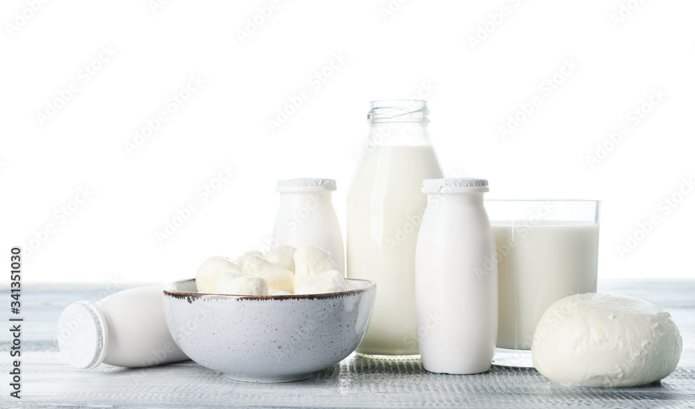 Different dairy products on table against white background Different dairy products on table against white background