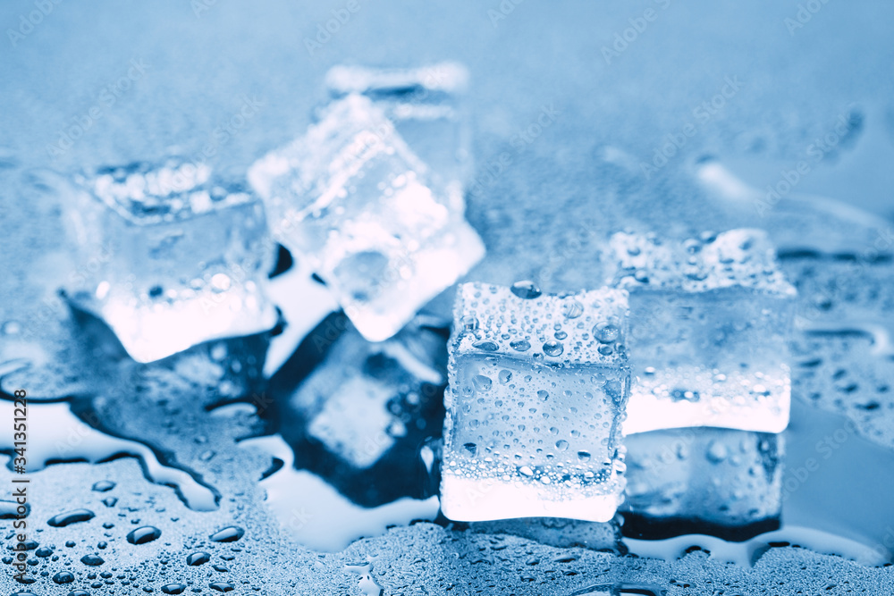Pyramid of beautiful thawed ice cubes with drops of water Pyramid of beautiful thawed ice cubes with drops of water