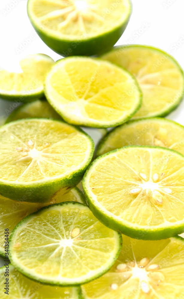 Lemon slices are stacked, isolated on a white background. Lemon slices are stacked, isolated on a white background.