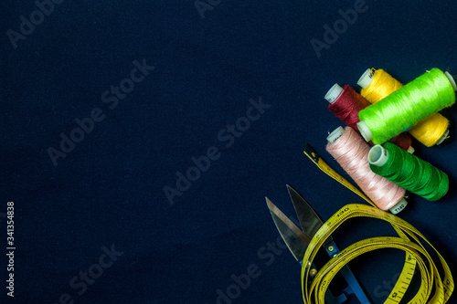 Set of tailoring tools and accessories on table