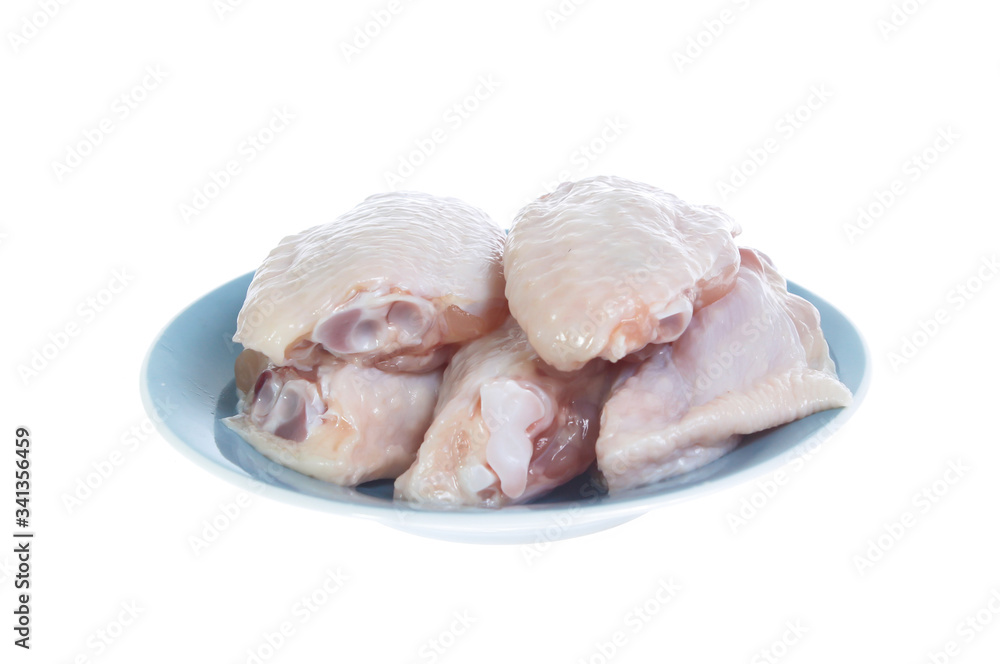 Raw chicken on cutting board on white background Raw chicken on cutting board on white background