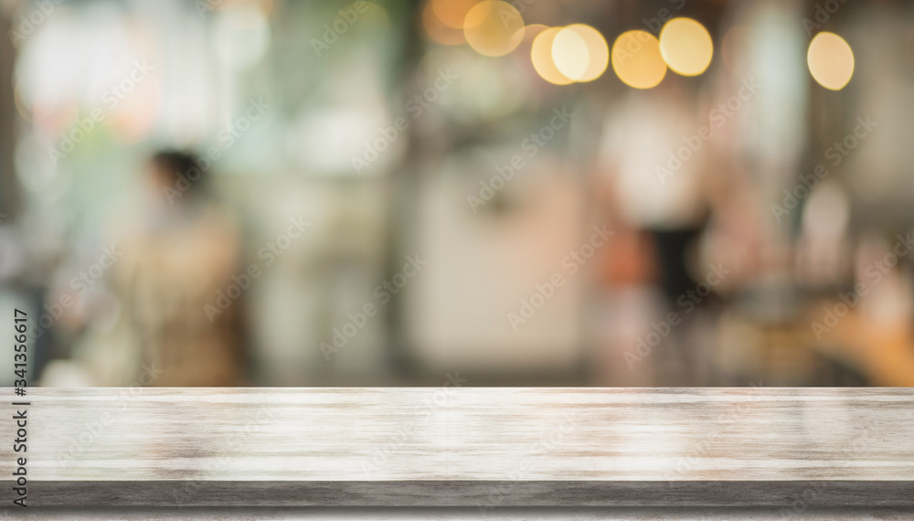 3D Rendering, Wooden top table with bokeh light effect and blur restaurant on background, blur background
