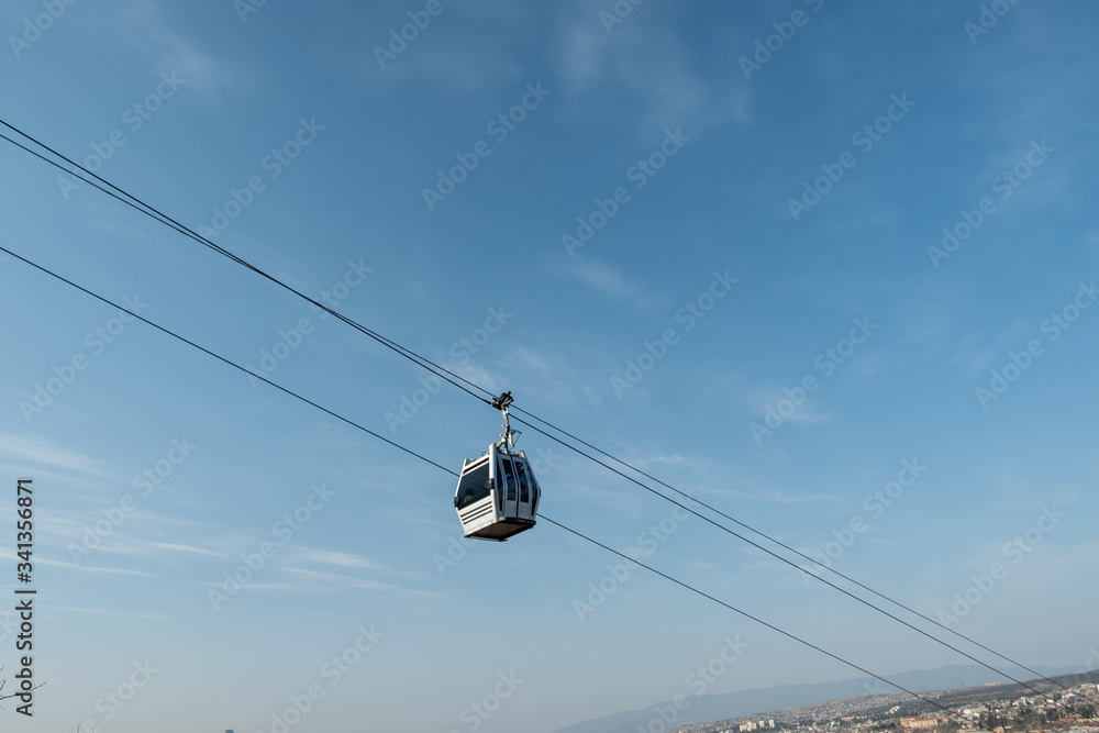 Cableway against the blue sky. Cableway against the blue sky.
