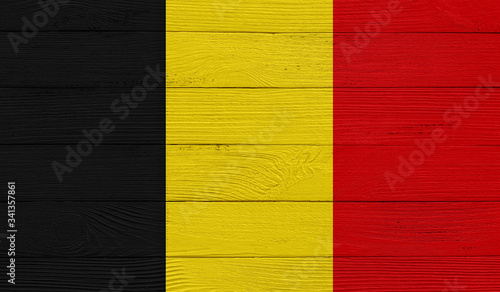 Belgium flag on a wooden texture. Wood texture, planks Wooden texture background flag.