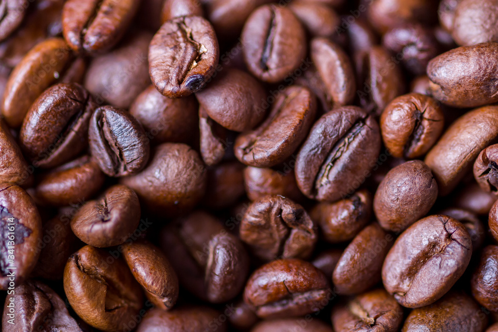Texture of coffee beans close-up view from above Texture of coffee beans close-up view from above