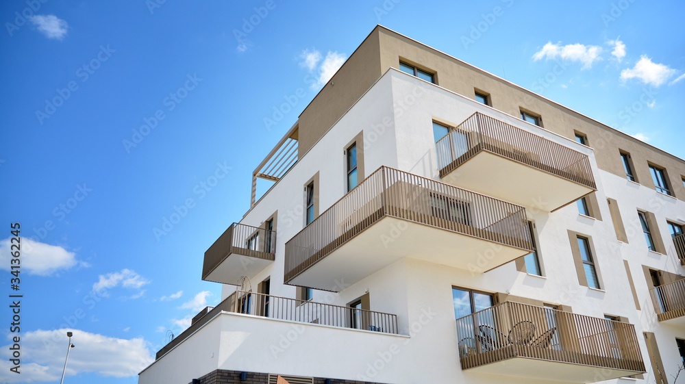 Fototapeta premium Facade of new residential building. Contemporary apartment building . Generic residential architecture.