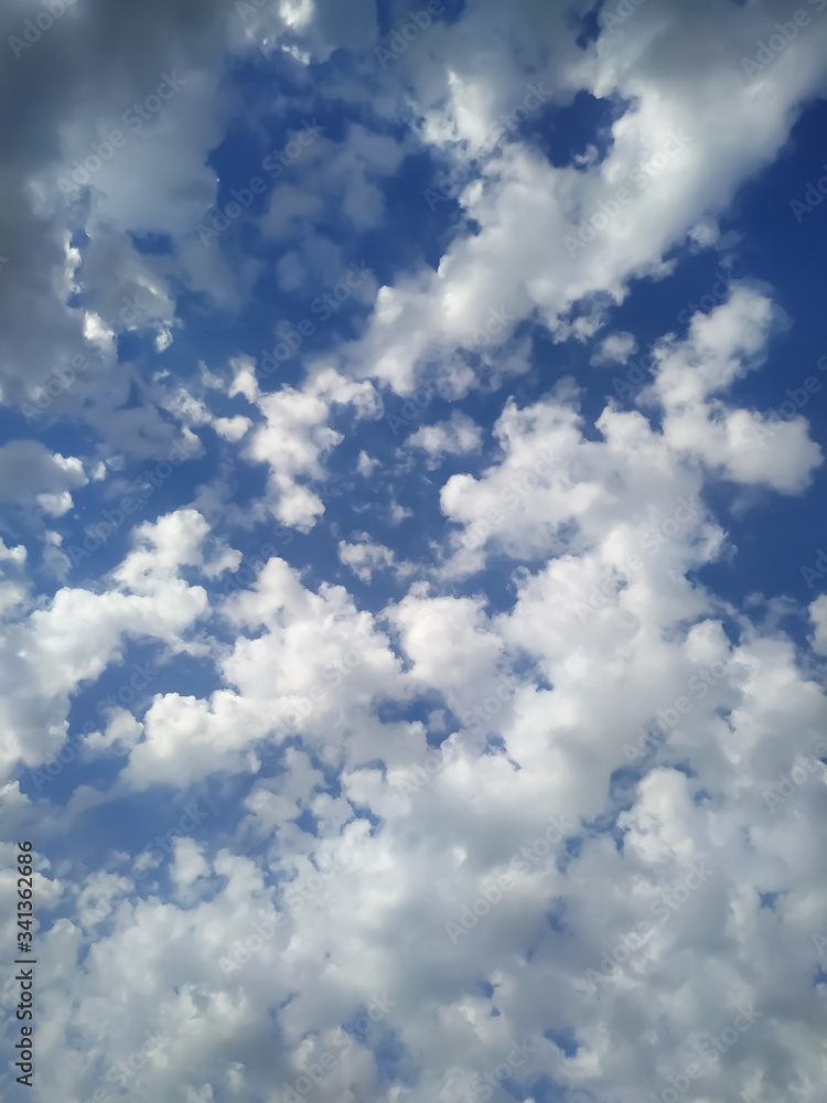Fototapeta premium Natural cloud fly sky blue landscape and sun rising at skyline.