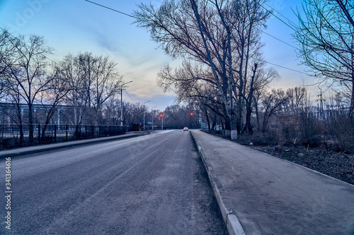 UST-KAMENOGORSK, KAZAKHSTAN - APRIL 04, 2020: Strange, amazing, unusual view of the empty streets of spring Ust-Kamenogorsk due to a pandemic - all people are sitting at home because of quarantine, KZ © udmurd