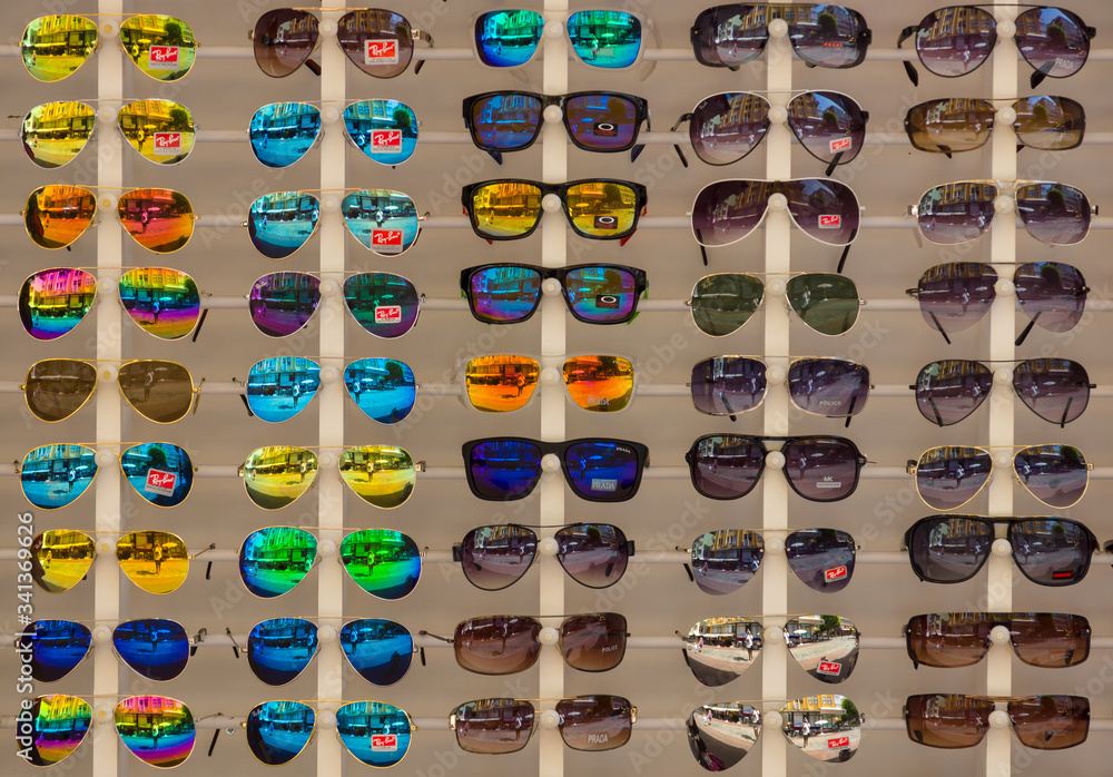 ALANYA, TURKEY - JUNE 28, 2014: Sunglasses Ray-Ban. Background. Ray-Ban is  a internationally well-known brand of sunglasses and eyeglasses founded in  1937. Stock Photo | Adobe Stock