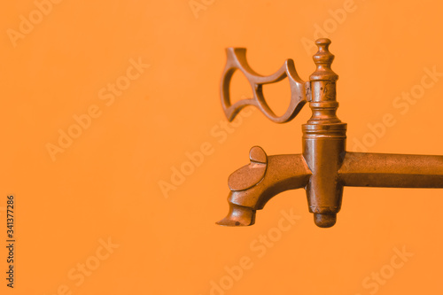Vintage copper faucet. Old bronze water tap.
