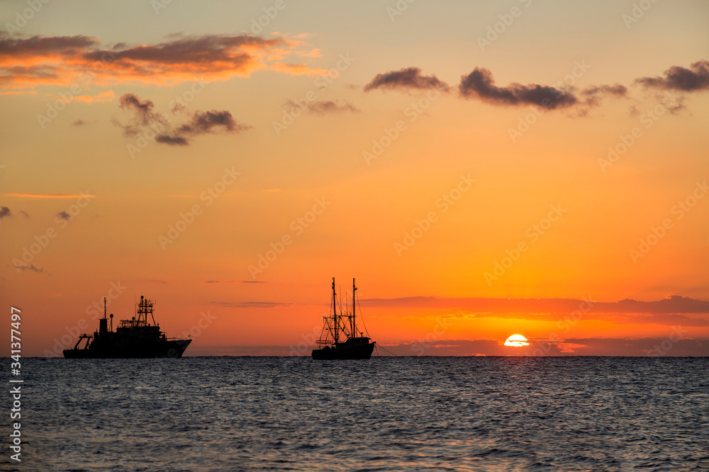 Sunset and ships in the Caribbean Sea