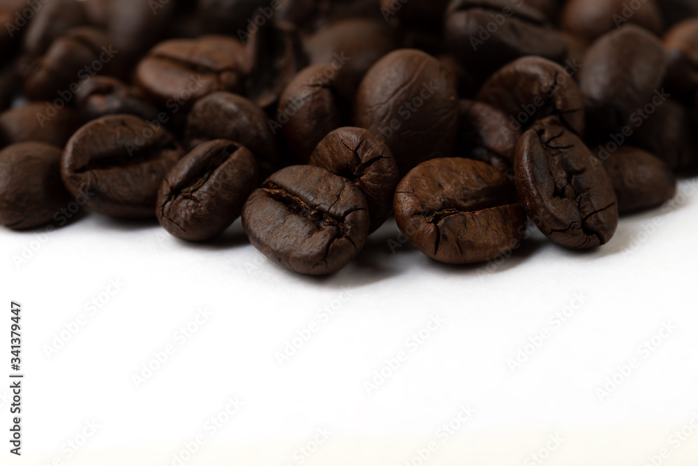 Roasted coffee beans isolated on white background Roasted coffee beans isolated on white background