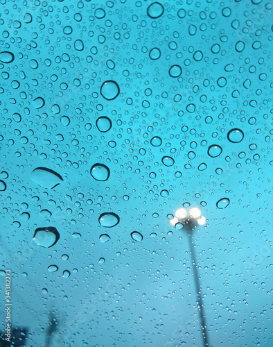 Rain drops on the windshield, Look from inside the car, Water Droplets season with Abstract Background, drops of water