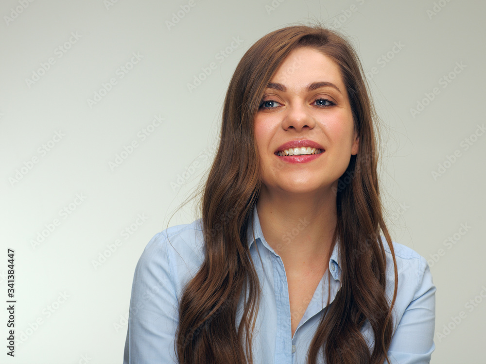 Smiling happy woman with long hair.