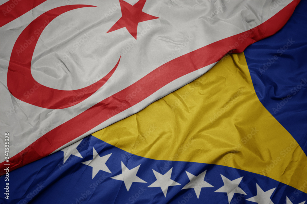 waving colorful flag of bosnia and herzegovina and national flag of northern cyprus. waving colorful flag of bosnia and herzegovina and national flag of northern cyprus.