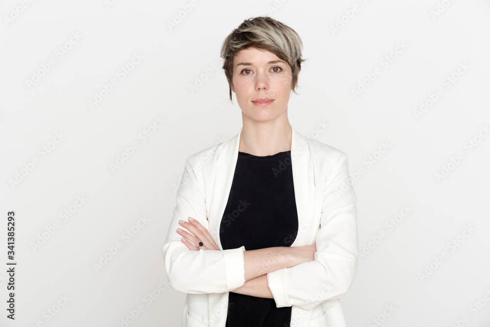 Portrait of woman with dyed short hair against white background Portrait of woman with dyed short hair against white background