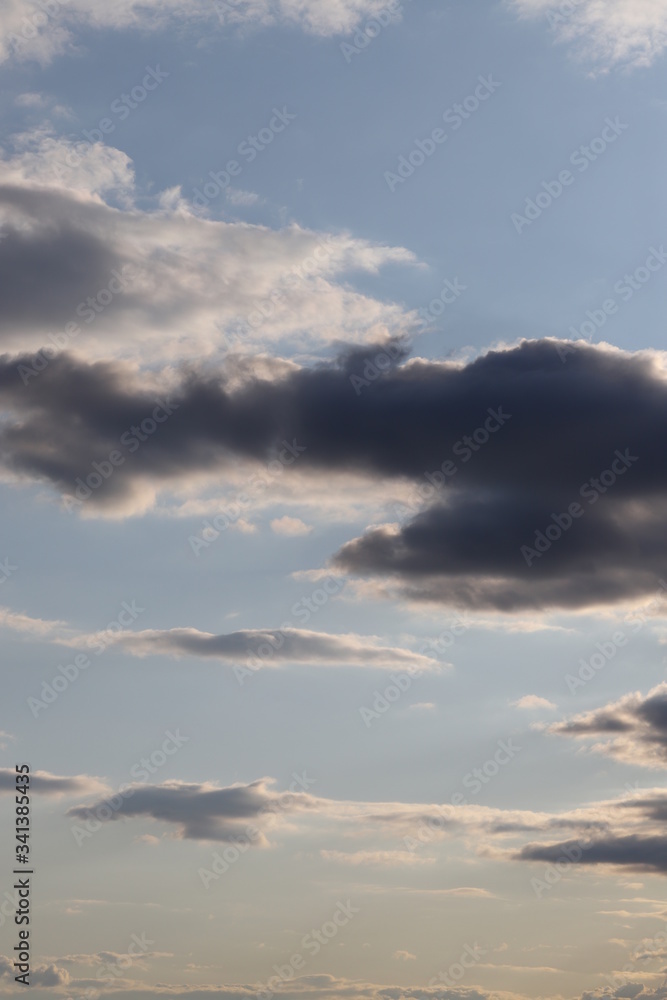 The evening sky after the rain. Spring sky with clouds. The evening sky after the rain. Spring sky with clouds.