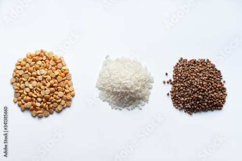 donation of food, rice, peas and buckwheat on a white background-delivery of coronavirus food