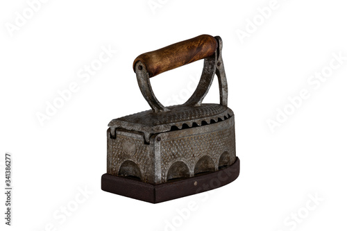 vintage antique iron with wooden handle isolated on white background