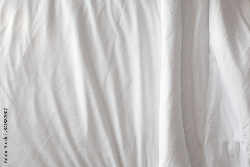 Wrinkled white blanket as a background Wrinkled white blanket as a background
