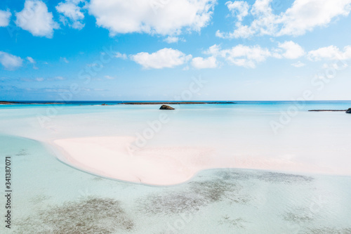 Long white sand bank on Coco Plum Beach, Exuma, Bahamas, Caribbean photo