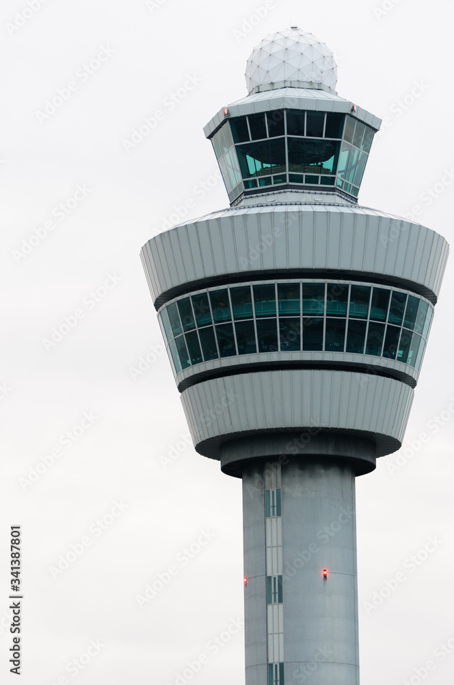 Airport control tower at an airport Stock Photo | Adobe Stock