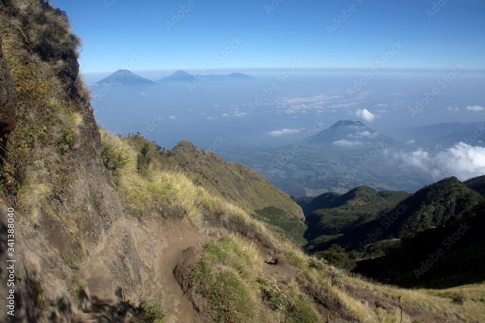 Naklejka premium Landscape view from the merbabu mountain hiking trail. Central Java/Indonesia