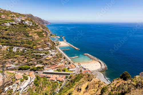 Portugal, Madeira, Calheta, High angle view of coastal town and artificial bay in summer photo