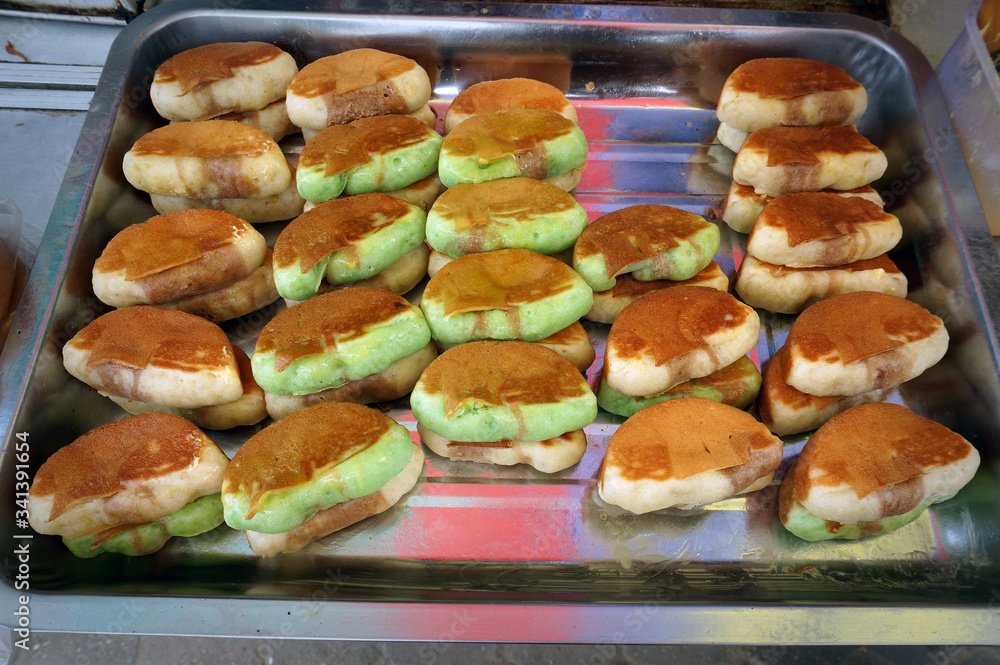 Pukis cake is Indonesia coconut milk cake. A humble simple street snack that easy to found in traditional markets     