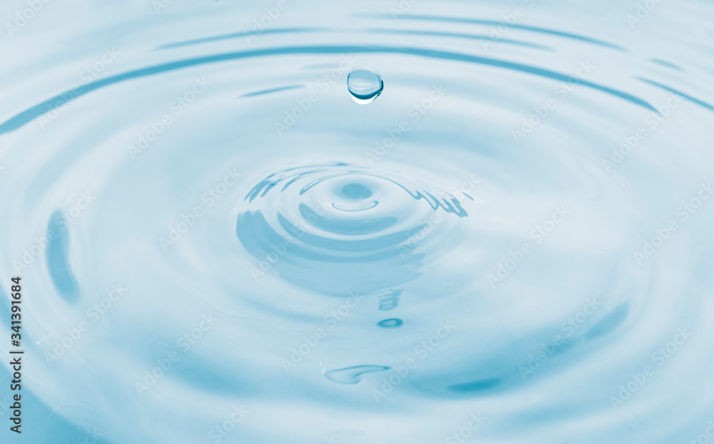 Water drop and splash background, small impact causes big changes. Ripple, macro wave on surface of liquid. Water drop and splash background, small impact causes big changes. Ripple, macro wave on surface of liquid.