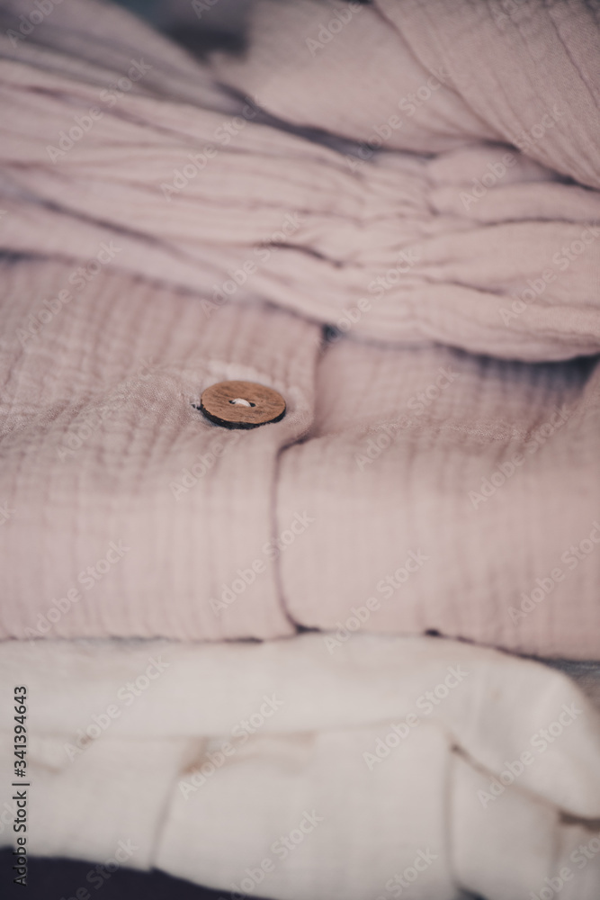Stack of textile in room. Spring female clothes. Fashionable. Stack of textile in room. Spring female clothes. Fashionable.
