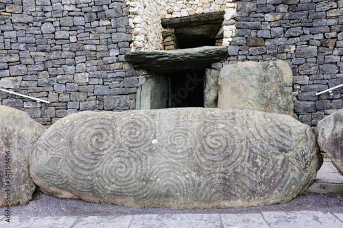 Canvas Print Spiral carvings on a kerb stone at the entrance to Newgrange chambered passage t