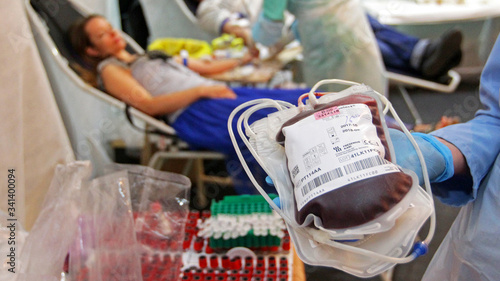 Donor donates blood in a hospital