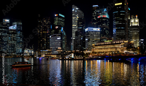 Singapore Downtown skyline at night. Financial district and business centers in technology smart urban city in Asia. Skyscraper and high-rise buildings.