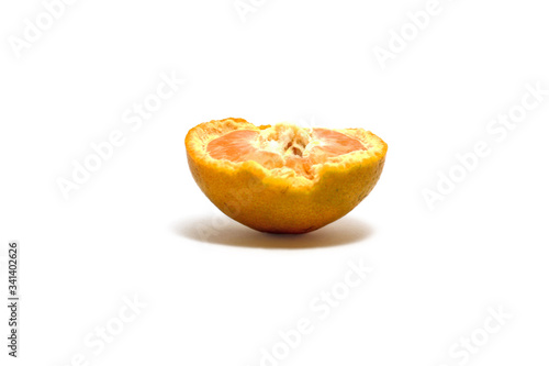 A ripped sweet orange  Citrus sinensis  isolated on white background  perfect for breakfasting during ramadan