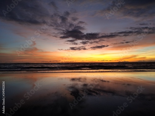 sunset on the beach © camilorios26