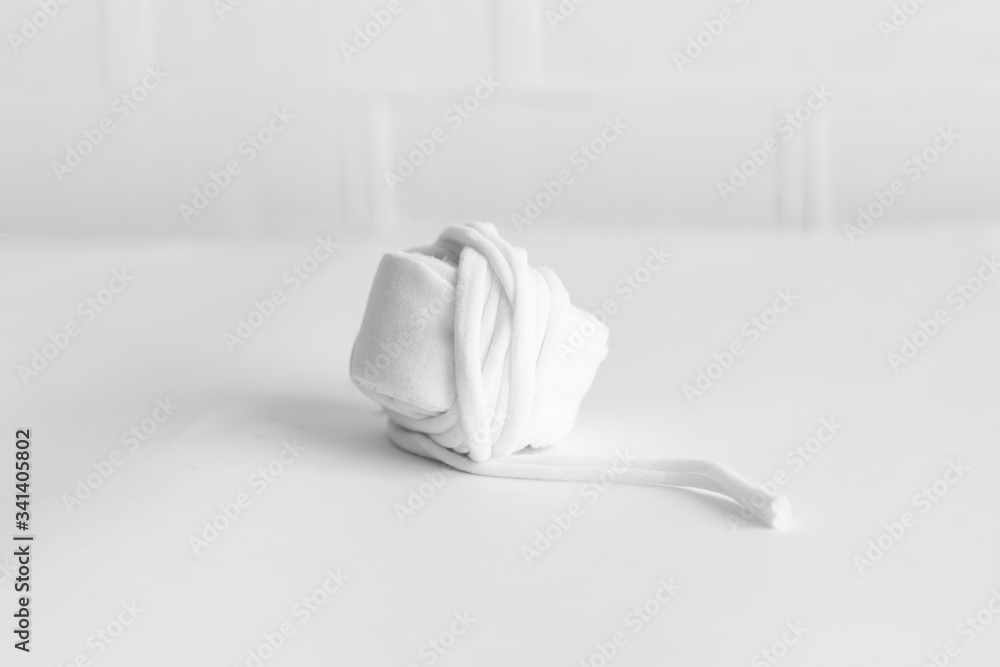 Obraz premium White yarn for knitting closeup